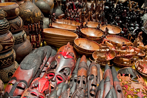 Handcrafted African wooden masks, bowls, and traditional artisan pieces